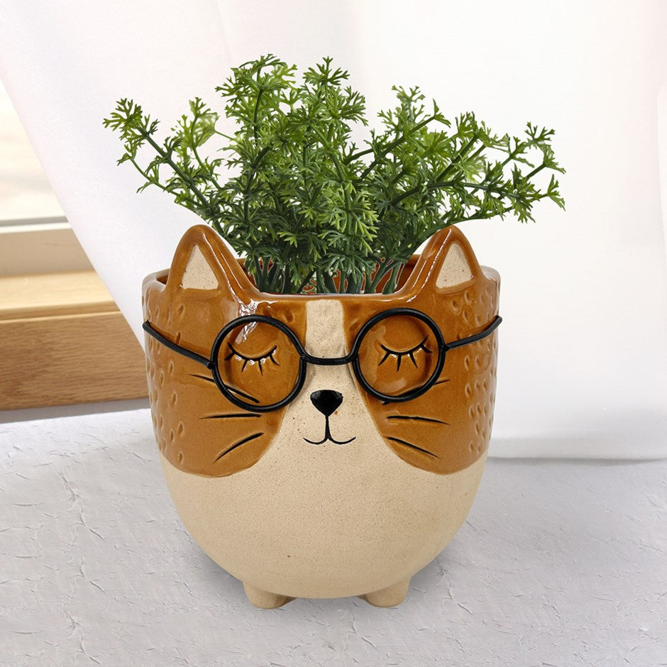 Pot en céramique avec visage de chat orange et lunettes