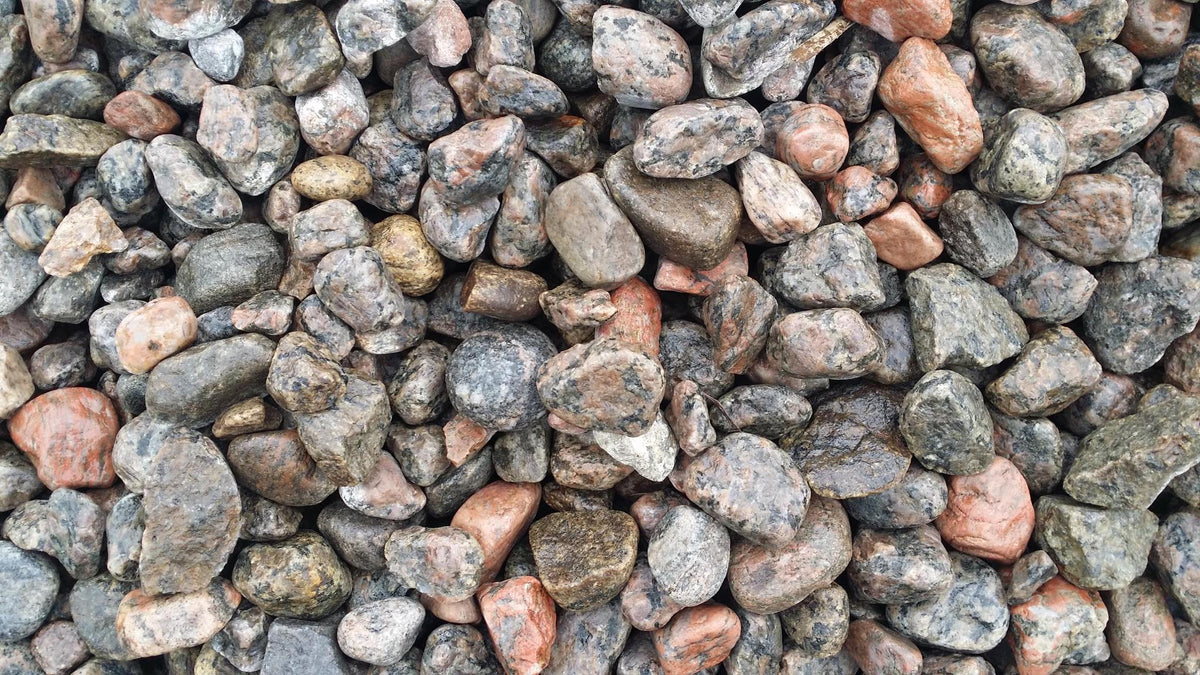 Pierre de rivière de granite en sac - produit versailles